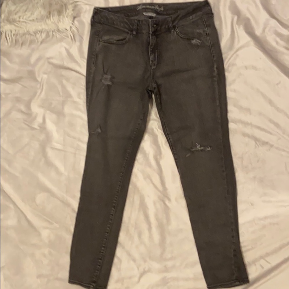 Black low rise ripped skinny jeans